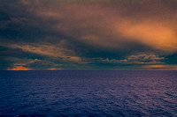 Stormy Sunset At Sea